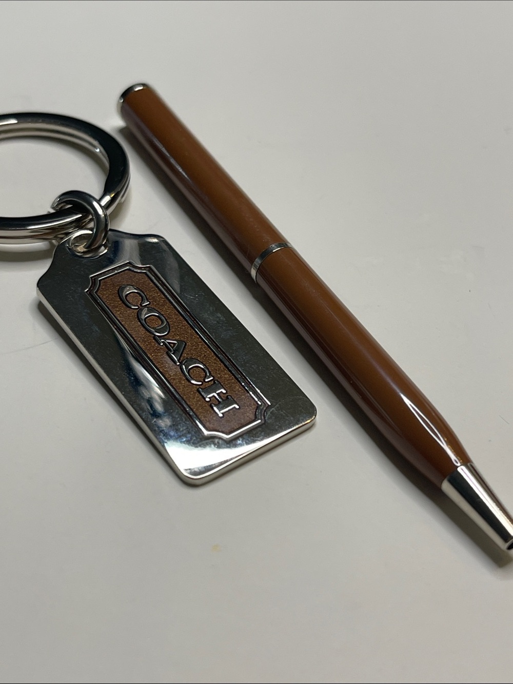 COACH Light Brown and Silver Metal Key Tag and Coach Pen